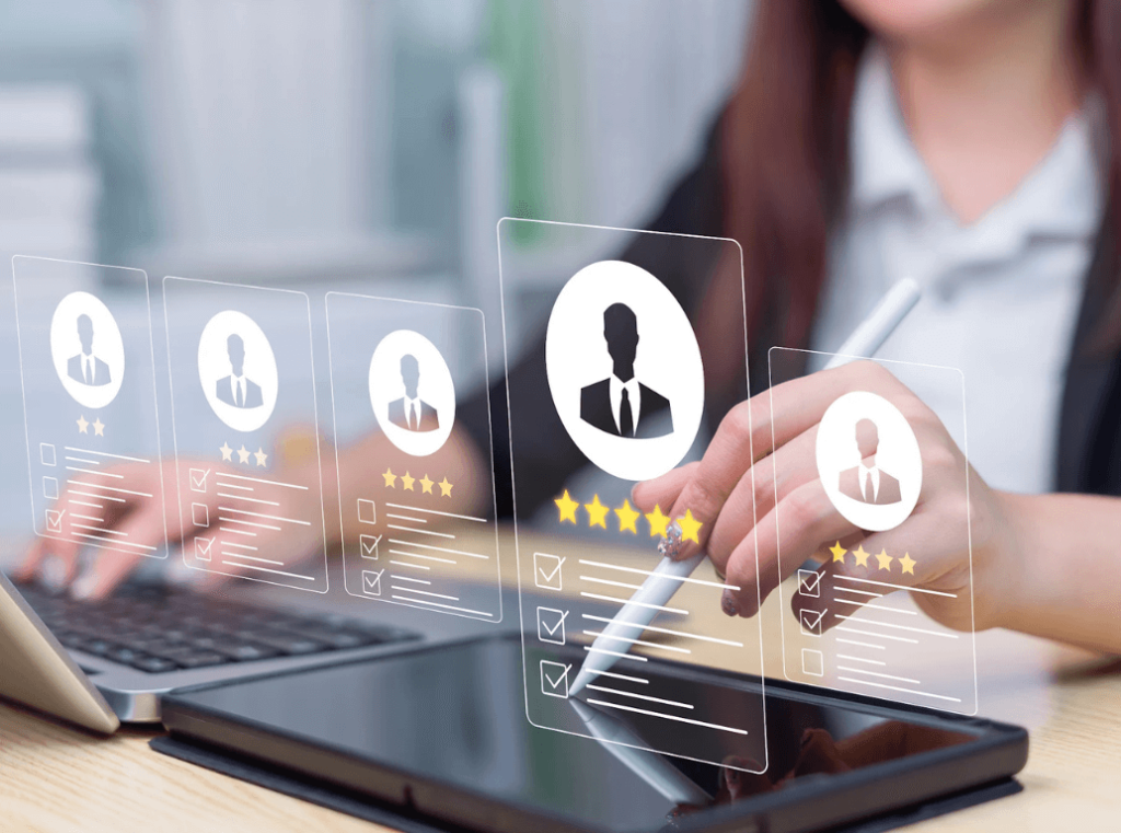 Recruiter reviewing digital candidate profiles with ratings and checklists on a tablet screen.
