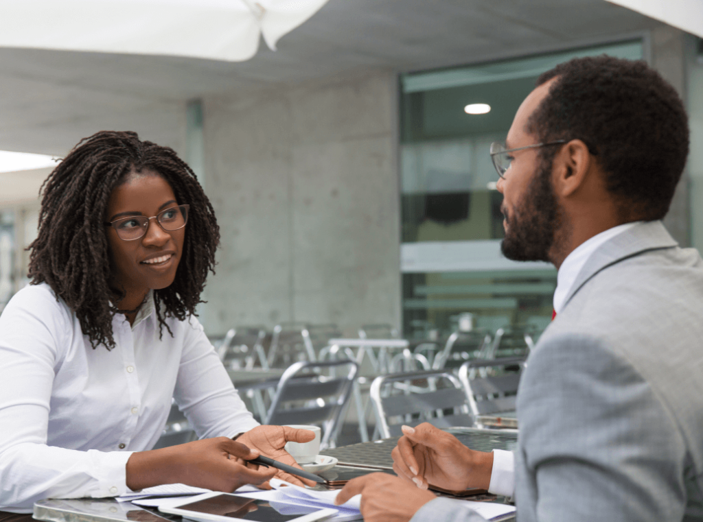 A recruitment professional engaging in a discussion with a candidate